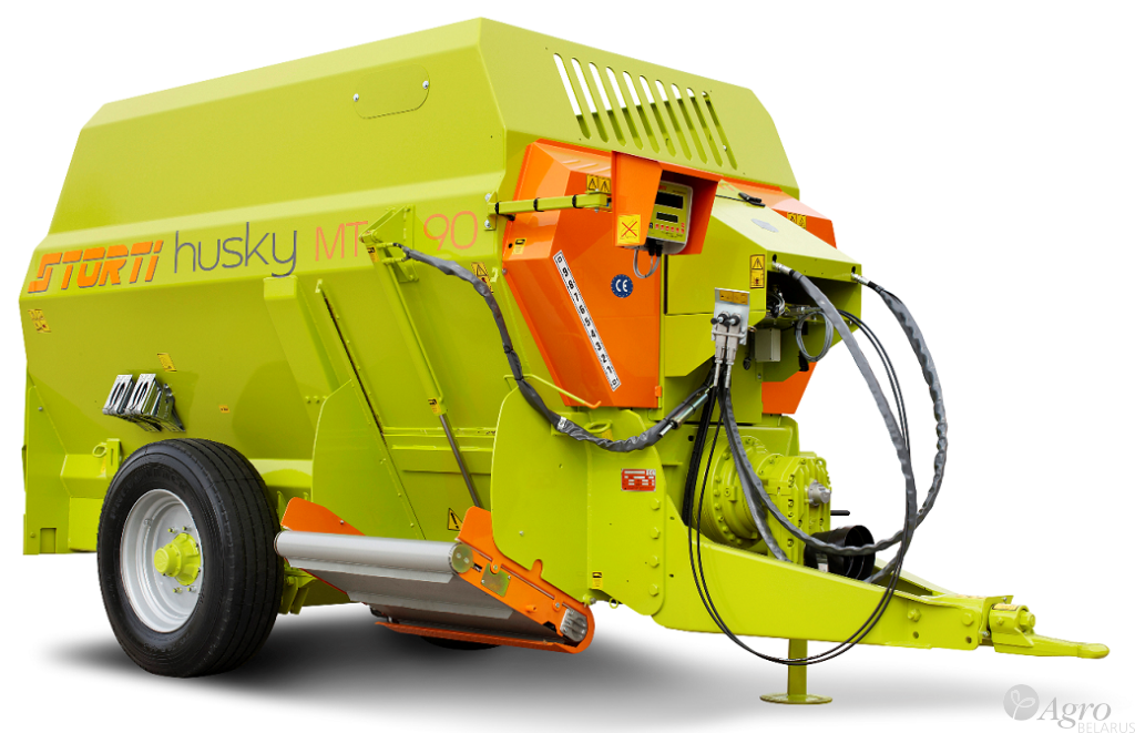 Кормораздатчик прицепной горизонтальный Husky DS 120 с бункером 12 м3